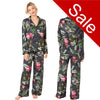 Black full floral tropical print mat satin pjs set consisting of a shirt style top with a collar, top pocket and button up front with matching full length trousers with an elasticated waist band in UK plus size 14, 16, 18, 20, 22, 24, 26, 28