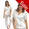 Ivory jacquard spot print satin pjs set consisting of a shirt style top with a collar, top pocket and button up front with matching full length trousers with an elasticated waist band in UK size 18