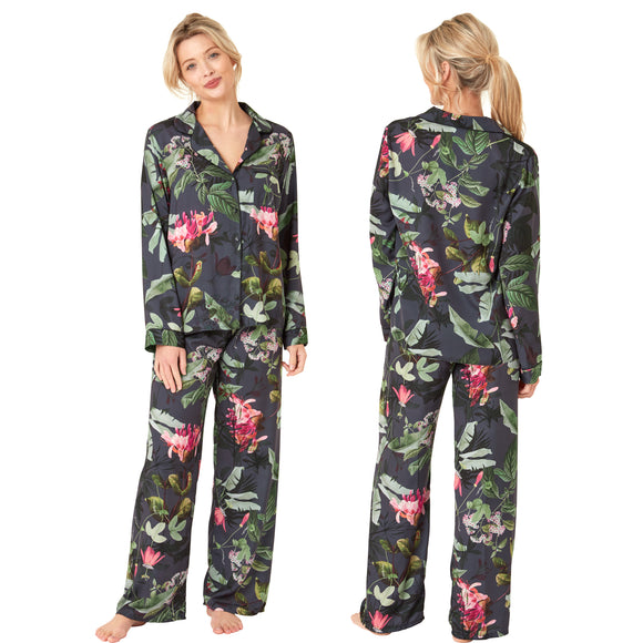 Black full floral tropical print mat satin pjs set consisting of a shirt style top with a collar, top pocket and button up front with matching full length trousers with an elasticated waist band in UK plus size 14, 16, 18, 20, 22, 24, 26, 28