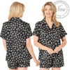 Black and white drawn heart print satin pjs set and they consist of a shirt style top with a collar, top pocket and button up front and short sleeves with matching shorts with an elasticated waist band. In UK size 10, 12, 14, 16, 18, 20