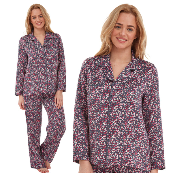 navy and pink ditsy floral print mat satin pjs set consisting of a shirt style top with full length sleeves, a collar, top pocket and a button up front with matching full length trousers in UK sizes 18, 20
