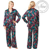 tribal tropical palm floral animal print style with a navy background in a shiny silky satin PJs Pyajamas set which are full length in UK sizes 18, 20,