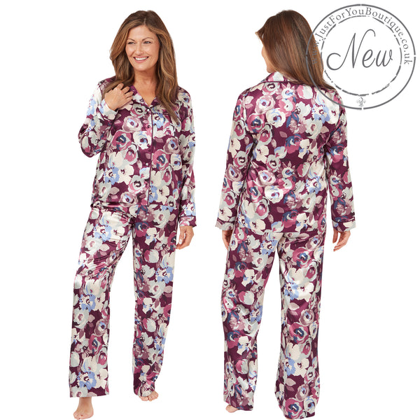 Abstract purple floral shiny satin pjs set consisting of a shirt style top with a collar, top pocket and button up front with matching full length trousers with an elasticated waist band in UK plus size 18, 20, 22, 24, 26, 28