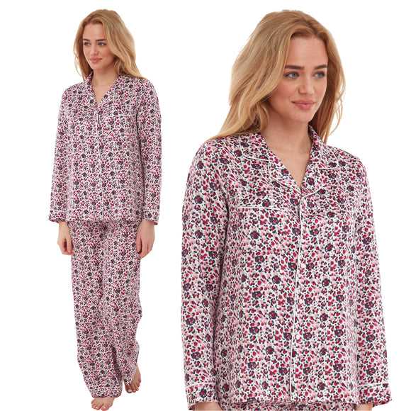 ivory background with a pink ditsy floral print mat satin pjs set consisting of a shirt style top with full length sleeves, a collar, top pocket and a button up front with matching full length trousers in UK sizes 18, 20