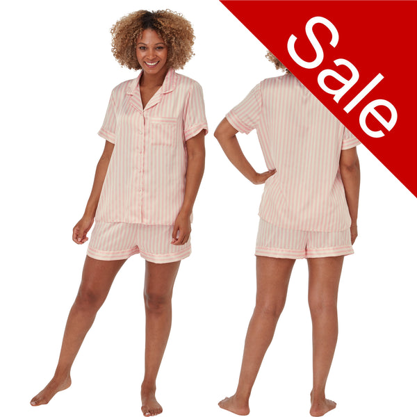 Pink and white candy stripe matt satin pjs set and they consist of a shirt style top with a collar, top pocket and button up front and short sleeves with matching shorts with an elasticated waist band. In UK size 14, 16, 18, 20