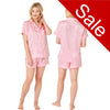 Pink drawn heart print satin pjs set and they consist of a shirt style top with a collar, top pocket and button up front and short sleeves with matching shorts with an elasticated waist band. In UK size 10, 12, 14, 16, 18, 20