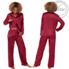 plain burgundy red silky shiny satin pjs set. They have a shirt style top with full length sleeves, a collar, top pocket and button up front. The trousers are full length with an elasticated waist band in UK sizes 18, 20