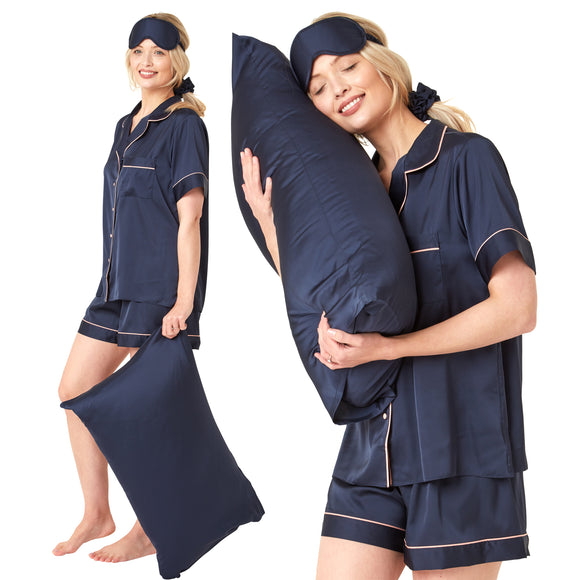 Plain dark navy blue matt satin pjs set consisting of a shirt style top with a collar, top pocket and button up front and short sleeves with matching shorts with an elasticated waist band. The pjs also come with a matching pillow case, eye mask and bobble. In UK size 14, 16, 18, 20