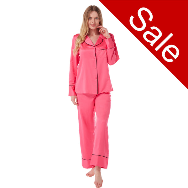 plain hot pink mat satin pjs set consisting of a shirt style top with full length sleeves, a collar, top pocket and a button up front with matching full length trousers in UK sizes 10, 12, 