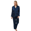 plain navy blue silky shiny satin pjs set consisting of a shirt style top with full length sleeves, a collar, top pocket and a button up front with matching full length trousers in UK sizes 8, 10, 12, 14,