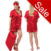 Red plain shiny satin pjs set consisting of a shirt style top with a collar, top pocket and button up front and short sleeves with matching shorts with an elasticated waist band. The pjs also come with a matching pillow case, eye mask and bobble.  In UK size 14, 16, 18, 20