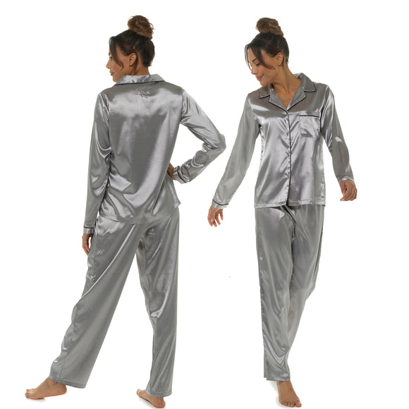 plain silver grey silky shiny satin pjs set consisting of a shirt style top with full length sleeves, a collar, top pocket and a button up front with matching full length trousers in UK plus sizes 8, 10, 12, 14, 16, 18, 20, 22