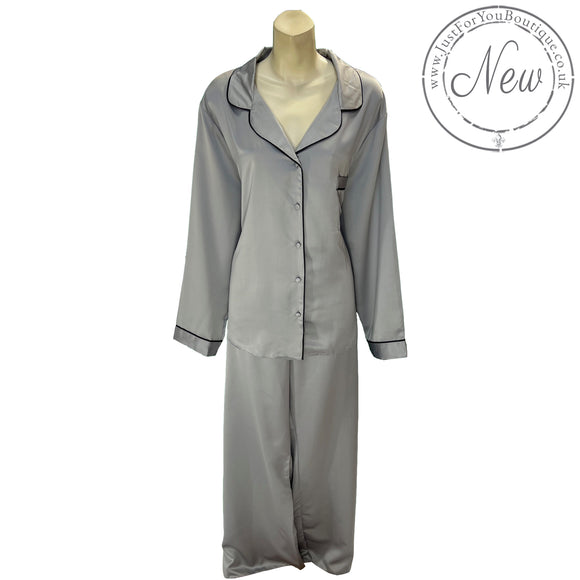 plain silver grey mat satin pjs set. They have a shirt style top with full length sleeves, a collar, top pocket and button up front. The trousers are full length with an elasticated waist band in UK plus sizes 22, 24, 26, 28