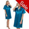 plain teal blue shiny silky satin nightshirt with a button front, collar, top pocket, short sleeve and shirt style hem in UK sizes 12, 14, 