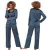 plain teal sea blue silky shiny satin pjs set consisting of a shirt style top with full length sleeves, a collar, top pocket and a button up front with matching full length trousers in UK plus sizes 18, 20, 26, 28,