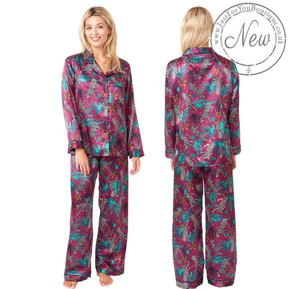 tribal tropical palm floral animal print style with a purple background in a shiny silky satin PJs Pyajamas set which are full length in UK sizes 18, 20,