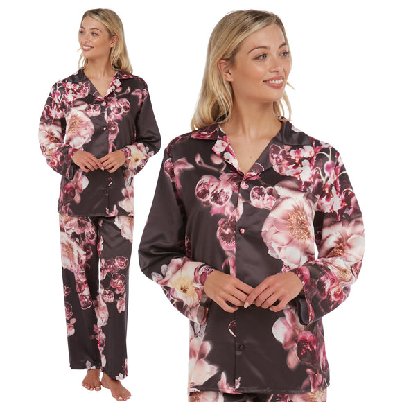 purple large floral print mat satin pjs set consisting of a shirt style top with full length sleeves, a collar, top pocket and a button up front with matching full length trousers in UK sizes 12, 14,