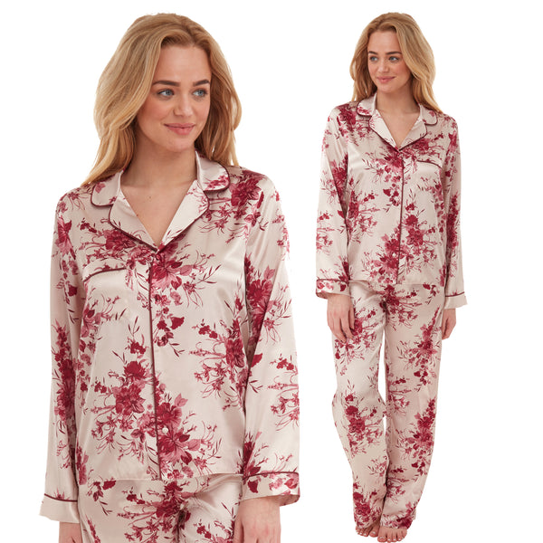 gold background with a red floral print silky shiny satin pjs set consisting of a shirt style top with full length sleeves, a collar, top pocket and a button up front with matching full length trousers in UK plus sizes 22, 24, 26, 28