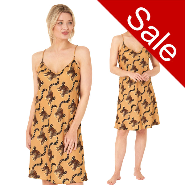 tribal style mustard background with a large Lemur print mat satin chemise nightie which is knee length with adjustable straps and a vee neck detail in UK plus sizes 12, 14, 16, 18, 20, 22, 24, 26, 28, 30, 32, 34, 36, 38