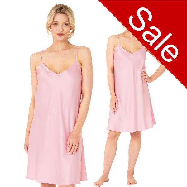 plain pastel pink satin chemise nightie which is knee length with adjustable straps and a vee neck detail in UK plus sizes 12, 14, 16, 18, 20, 22, 24, 26, 28, 30, 32, 34, 36, 38