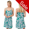 Green forest leaf print with a lilac background satin chemise nightie which is knee length with adjustable straps and a vee neck detail in UK sizes 12, 14, 16, 18, 