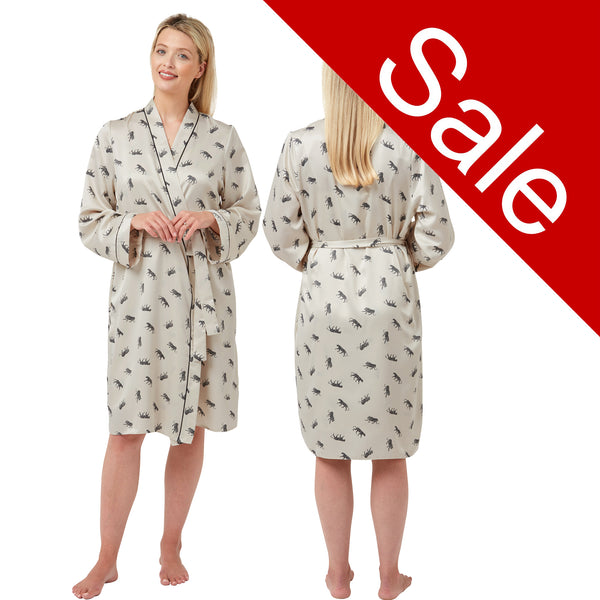 Cheetah animal print style with a ivory background in a silky mat satin wrap, dressing gown, bathrobe, kimono which is knee length with adjustable straps and a vee neck detail in UK sizes 10, 12, 14, 16, 18, 20