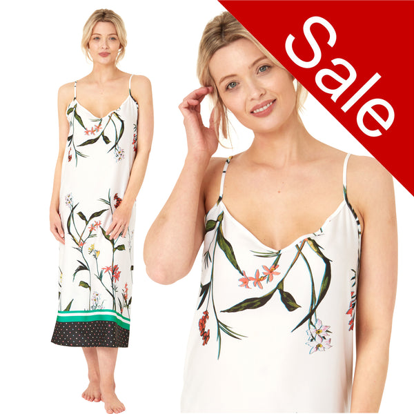 Long full length mat satin chemise nightdress with string adjustable straps with a white background with a large trailing floral print with a black polka dot border hem in UK plus sizes 12, 14, 16, 18, 20, 22, 24, 26, 28, 30, 32, 34, 36, 38