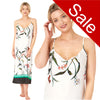 Long full length mat satin chemise nightdress with string adjustable straps with a white background with a large trailing floral print with a black polka dot border hem in UK plus sizes 12, 14, 16, 18, 20, 22, 24, 26, 28, 30, 32, 34, 36, 38
