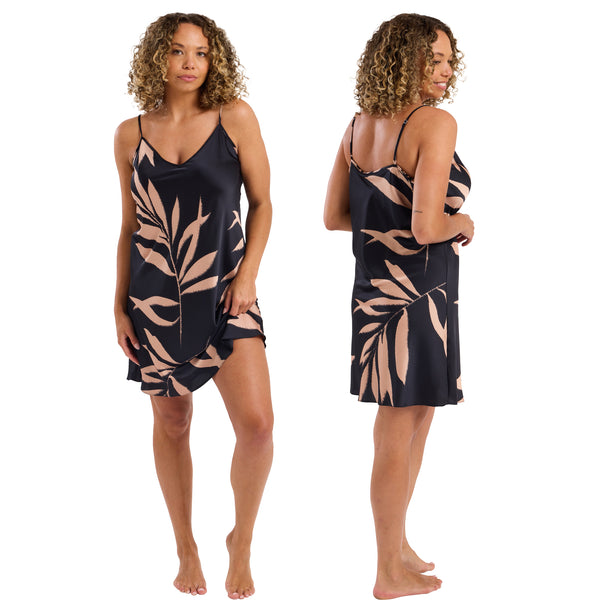 Charcoal black botanical tropical palm floral print mat satin chemise, nightie which is knee length with adjustable straps and a vee neck detail in UK plus sizes 16, 18, 20, 22, 24, 26