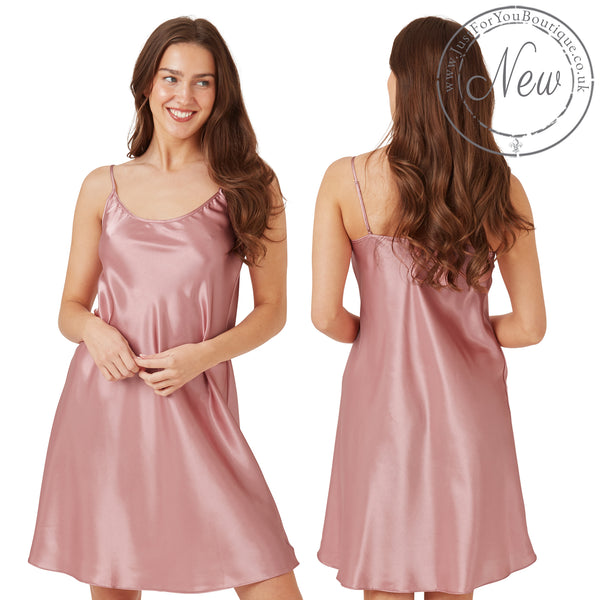 plain blush pink shiny silky satin chemise nightie which is knee length with adjustable straps and a round neck detail in UK sizes 16, 18, 20, 22, 24, 26