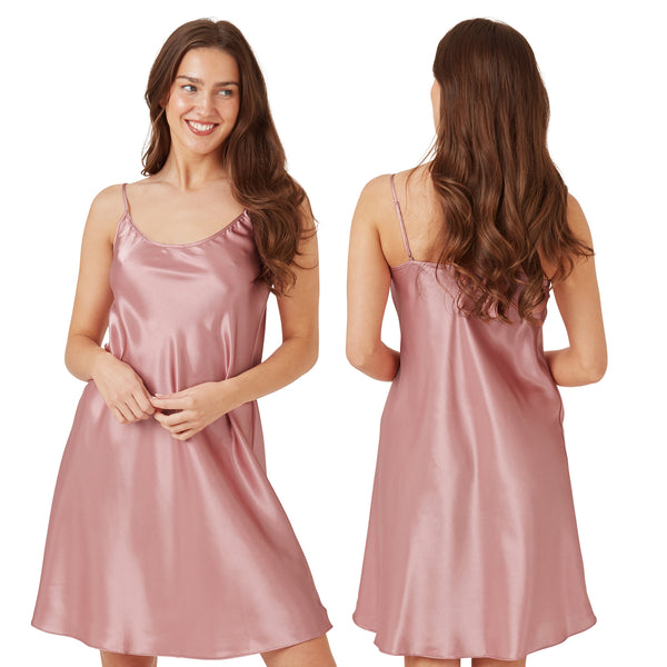 plain blush pink shiny silky satin chemise nightie which is knee length with adjustable straps and a round neck detail in UK sizes 16, 18, 20, 22, 24, 26