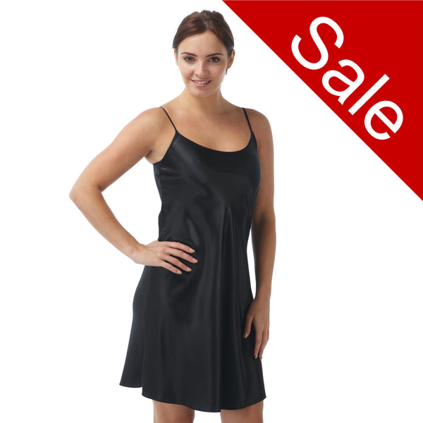 plain black shiny silky satin chemise nightie which is knee length with adjustable straps and a round neck detail in UK sizes 8, 10, 12, 14, 16, 18