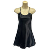 plain shiny silky black satin chemise nightie which is short length with fixed straps and a round neck detail in UK sizes 10, 12, 14, 16, 18, 20, 22, 24