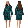 Jade green oversized animal print style with a black background in a silky shiny satin wrap, dressing gown, bathrobe, kimono which is knee length with adjustable straps and a vee neck detail in UK sizes 10, 12, 14, 16, 18, 20