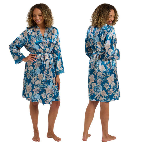 Teal blue oversized bloom floral print style in a silky shiny satin wrap, dressing gown, bathrobe, kimono which is knee length with adjustable straps and a vee neck detail in UK size 12, 14, 