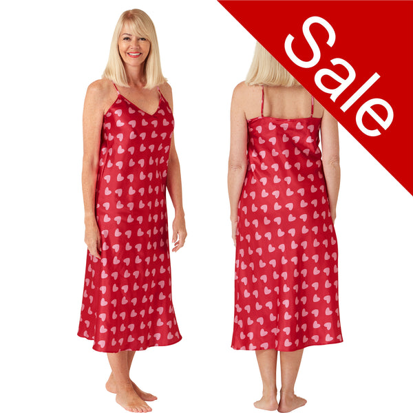 Long full length silky shiny satin chemise nightdress with string adjustable straps with a red background and a pink heart spot print in UK plus sizes 8, 10, 12, 14, 16, 18, 20, 22,