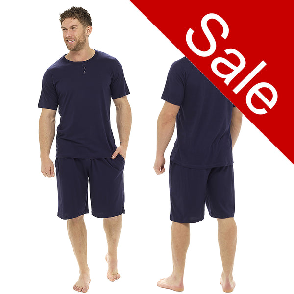 mens plain navy pjs set which have a t shirt top with short sleeves and shorts with an elasticated waist band in sizes medium or large