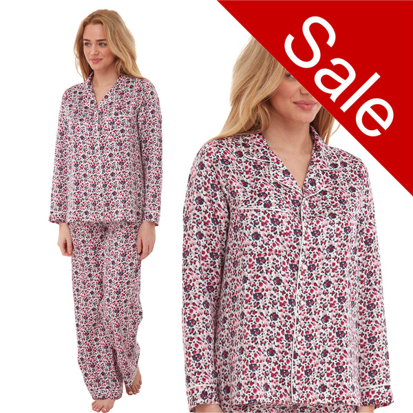 Floral blue and pink abstract print shiny satin pjs set consisting of a shirt style top with a collar, top pocket and button up front with matching full length trousers with an elasticated waist band in UK size 18-20