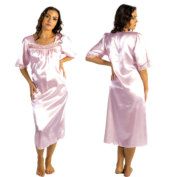 plain light pink shiny silky satin classic style mid length nightdress which is straight in fit with gathered fabric to the chest and elbow length sleeves. The chest and sleeves are trimmed with floral lace and it it available in UK plus sizes 8, 10, 12, 14, 16, 18, 20, 22, 24, 26, 28, 30, 32, 34