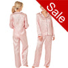Pink jacquard star print shiny satin pjs set consisting of a shirt style top with a collar, top pocket and button up front with matching full length trousers with an elasticated waist band in UK plus size 14, 16, 18, 20, 22, 24, 26, 28