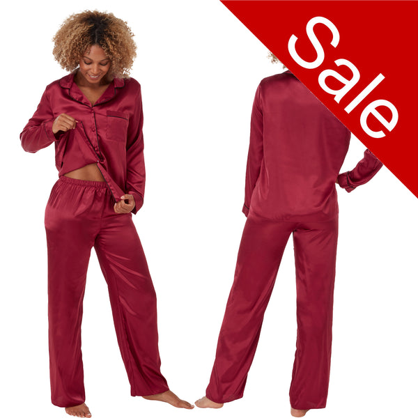 plain burgundy red silky shiny satin pjs set. They have a shirt style top with full length sleeves, a collar, top pocket and button up front. The trousers are full length with an elasticated waist band in UK sizes 18, 20