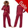 plain burgundy red silky shiny satin pjs set. They have a shirt style top with full length sleeves, a collar, top pocket and button up front. The trousers are full length with an elasticated waist band in UK sizes 18, 20