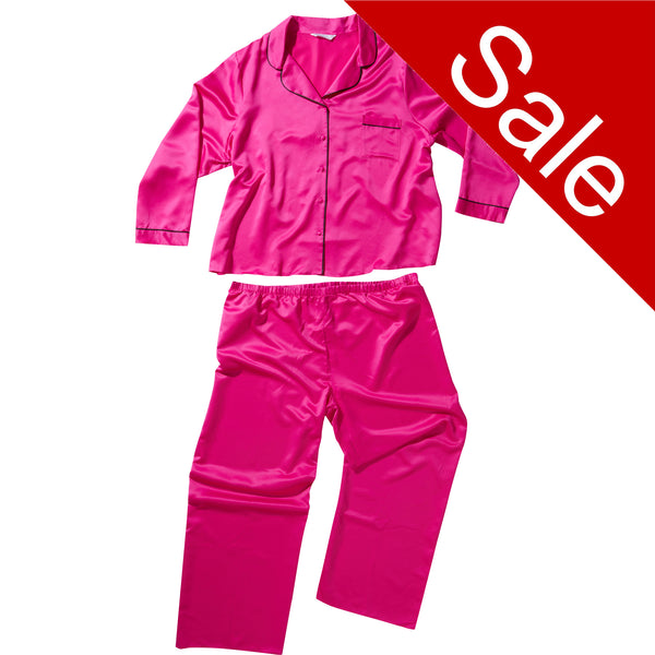 plain hot pink mat satin pjs set. They have a shirt style top with full length sleeves, a collar, top pocket and button up front. The trousers are full length with an elasticated waist band in UK plus sizes 26, 28