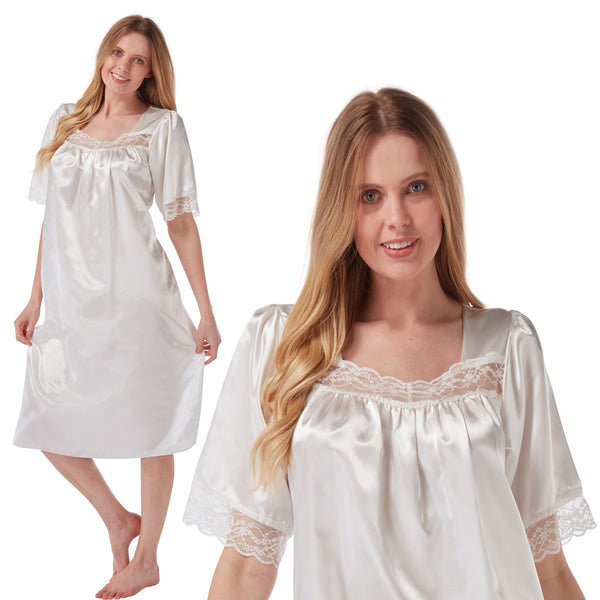 plain ivory white shiny silky satin classic style mid length nightdress which is straight in fit with gathered fabric to the chest and elbow length sleeves. The chest and sleeves are trimmed with floral lace and it it available in UK plus sizes 8, 10, 12, 14, 16, 18, 20, 22, 24, 26, 28, 30, 32, 34