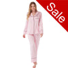 plain light pink mat satin pjs set consisting of a shirt style top with full length sleeves, a collar, top pocket and a button up front with matching full length trousers in UK sizes 8, 10, 12, 14, 16,