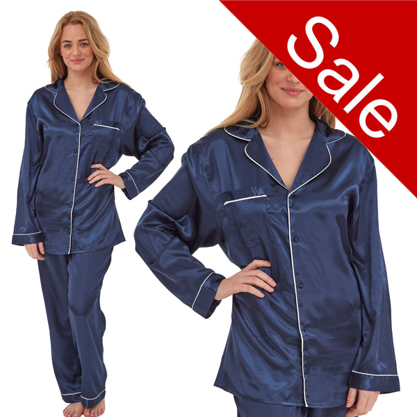 plain navy blue silky shiny satin pjs set consisting of a shirt style top with full length sleeves, a collar, top pocket and a button up front with matching full length trousers in UK plus sizes 14, 16, 18, 20, 22, 24,