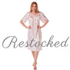 plain light pink shiny silky satin classic style mid length nightdress which is straight in fit with gathered fabric to the chest and elbow length sleeves. The chest and sleeves are trimmed with floral lace and it it available in UK plus sizes 8, 10, 12, 14, 16, 18, 20, 22, 24, 26, 28, 30, 32, 34