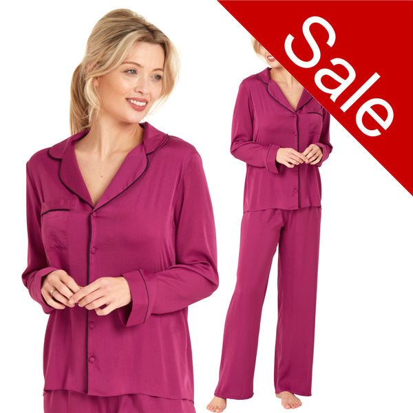 Plum purple plain mat satin pjs set consisting of a shirt style top with a collar, top pocket and button up front with matching full length trousers with an elasticated waist band in UK plus size 14, 16, 18, 20, 22, 24, 26, 28