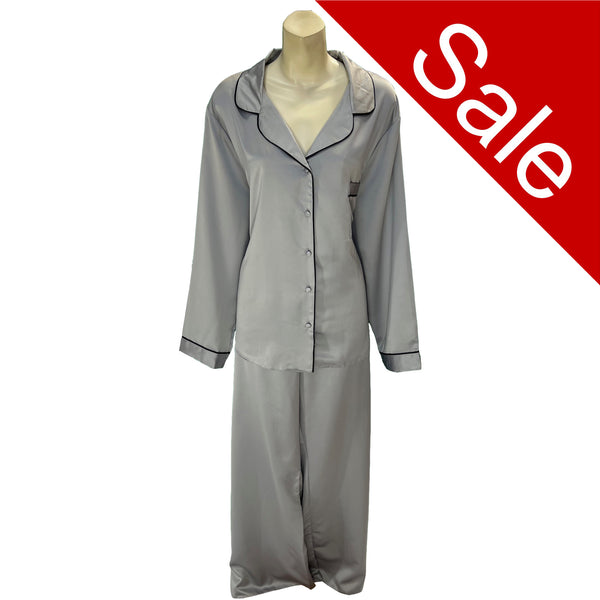 plain silver grey mat satin pjs set. They have a shirt style top with full length sleeves, a collar, top pocket and button up front. The trousers are full length with an elasticated waist band in UK plus sizes 22, 24, 26, 28