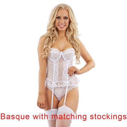 unpadded and underwired white floral lace basque with matching thong with vertical bones and detachable suspenders and straps with matching stockings in UK sizes 40D, 42B